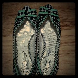 Black and white with turquoise toe shoes